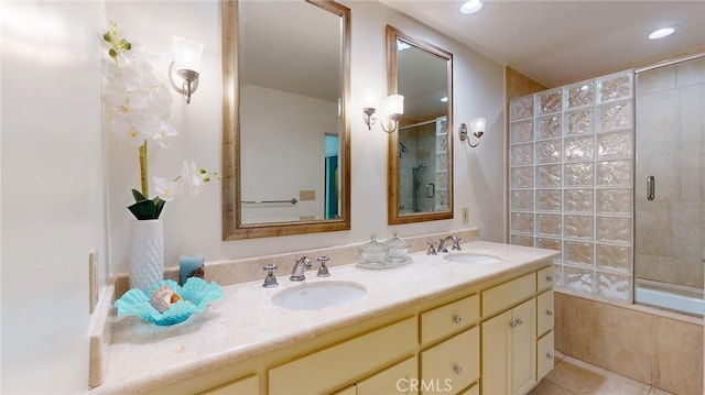 bathroom featuring tile patterned flooring and vanity