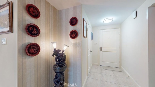 hallway with light tile patterned floors