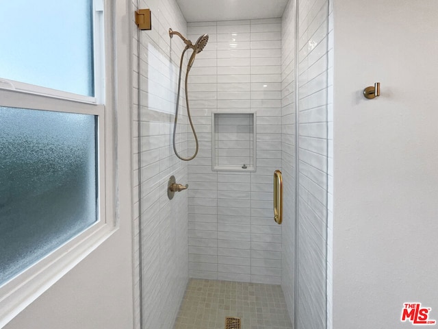 bathroom with an enclosed shower