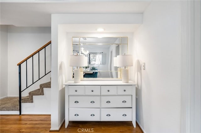 bathroom featuring vanity and hardwood / wood-style floors