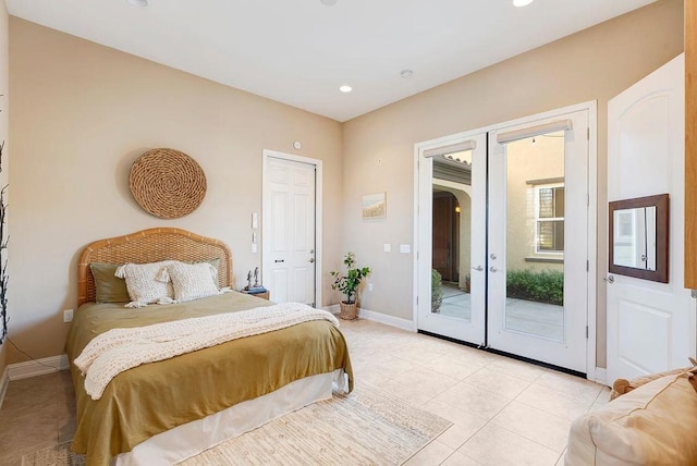 bedroom featuring access to outside and light tile patterned floors