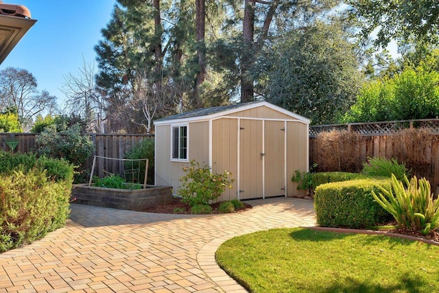 view of outbuilding with a lawn