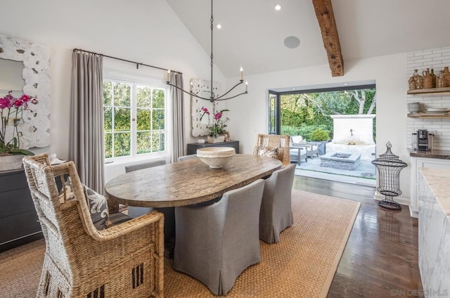 dining room with an inviting chandelier, dark hardwood / wood-style flooring, high vaulted ceiling, and beam ceiling