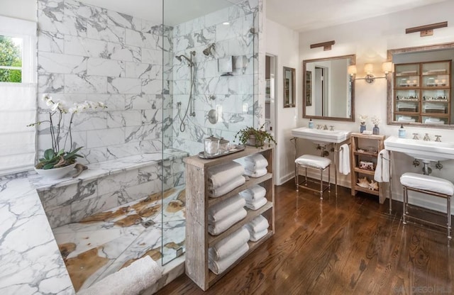 bathroom with hardwood / wood-style floors and walk in shower