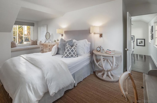 bedroom with vaulted ceiling