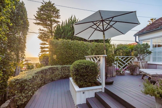 view of deck at dusk