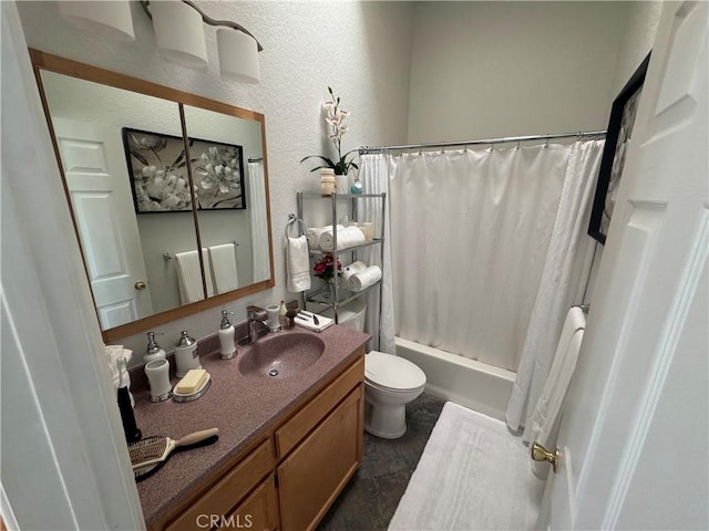 full bathroom with vanity, toilet, and shower / bath combo with shower curtain