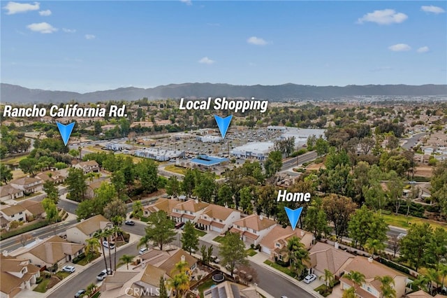 aerial view featuring a mountain view