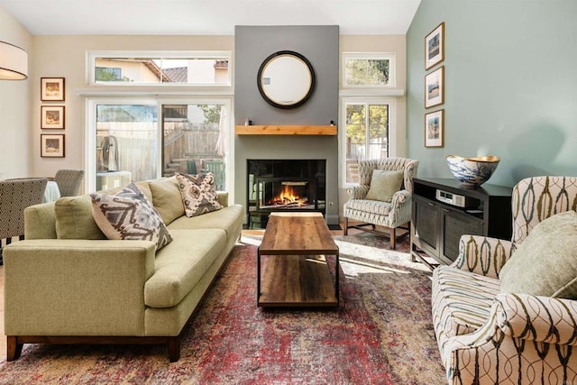 sitting room featuring lofted ceiling