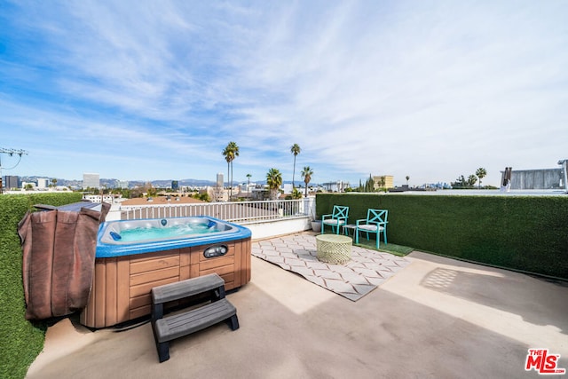 view of patio with a hot tub