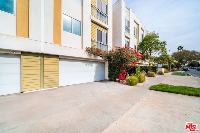 view of property featuring a garage