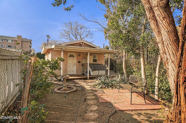 view of front of house with a patio