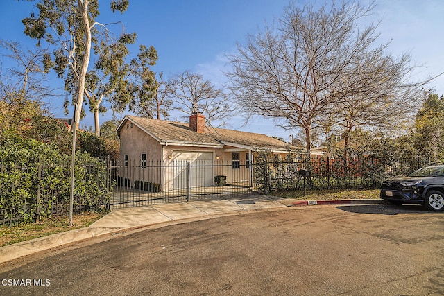 view of front of home featuring a garage