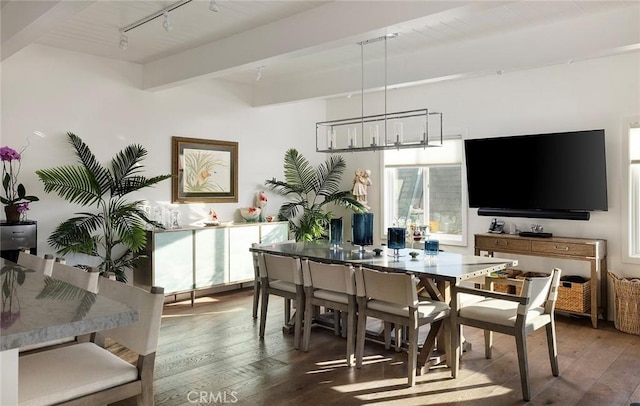 dining room featuring beamed ceiling, hardwood / wood-style flooring, wood ceiling, track lighting, and an inviting chandelier