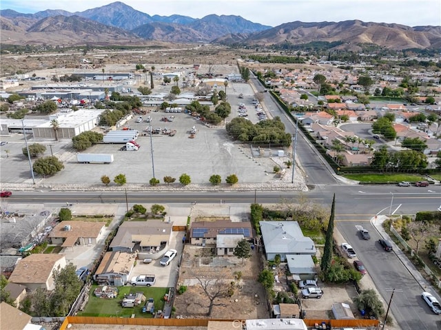 drone / aerial view featuring a mountain view