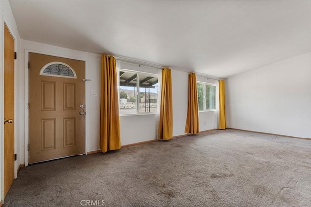 entryway with carpet floors