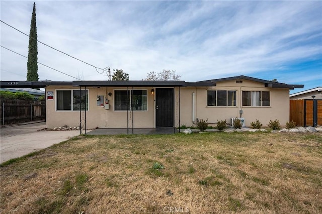 ranch-style home with a front yard