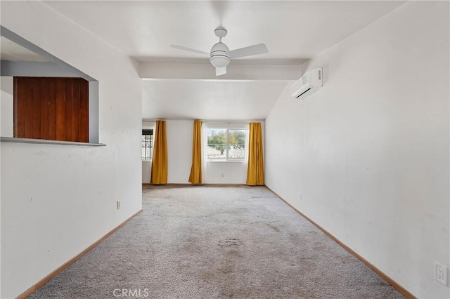 unfurnished room with light carpet, an AC wall unit, and ceiling fan