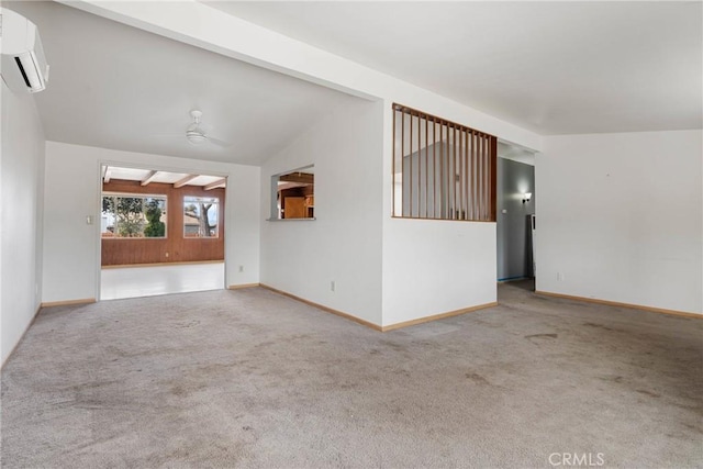 carpeted spare room featuring vaulted ceiling with beams, a wall mounted AC, and ceiling fan