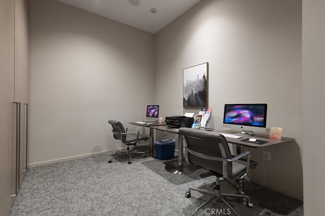 home office with baseboards and carpet flooring