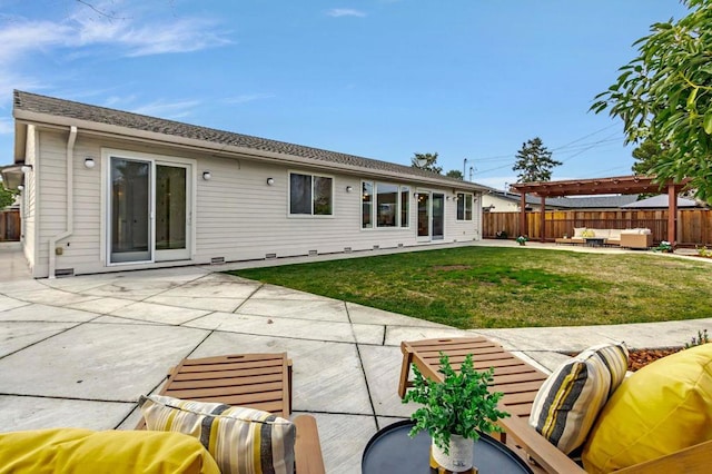 back of property with a pergola, a yard, a patio area, and outdoor lounge area