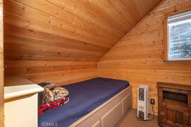 bedroom featuring vaulted ceiling, wooden ceiling, and wooden walls