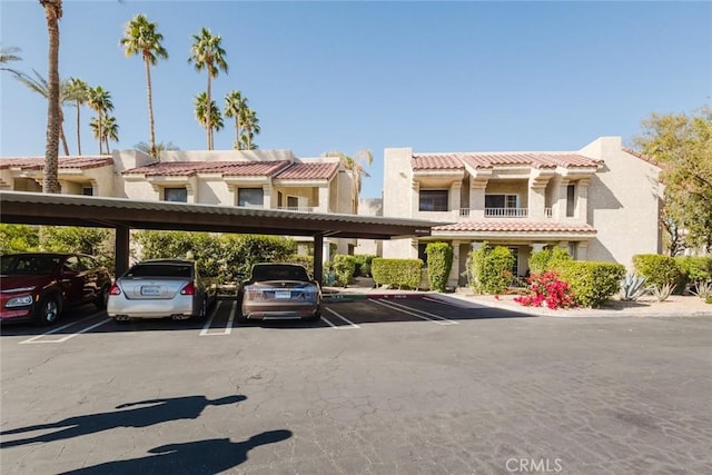 view of parking featuring a carport