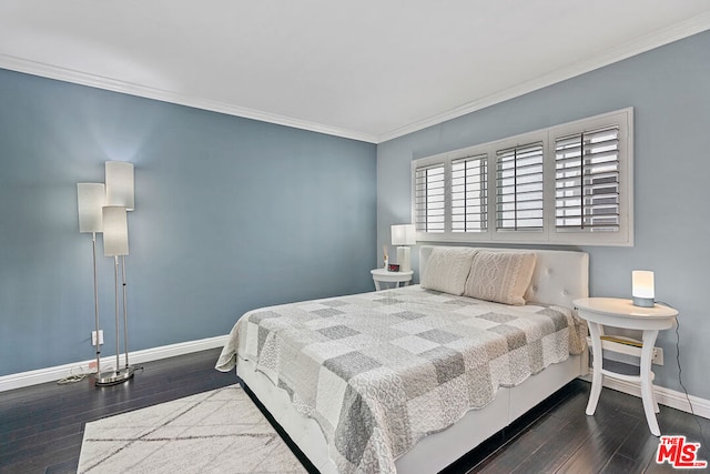 bedroom featuring crown molding and dark hardwood / wood-style flooring