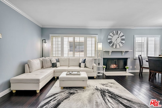 living room featuring crown molding, a wealth of natural light, and dark hardwood / wood-style flooring