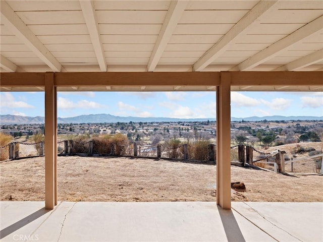 view of yard with a mountain view and a patio