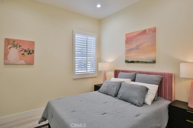 bedroom featuring hardwood / wood-style floors