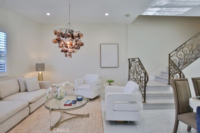 living room featuring a chandelier