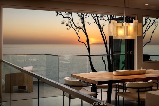 balcony at dusk with a water view