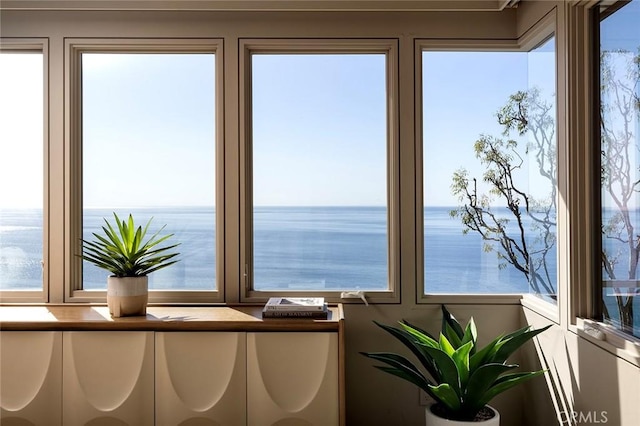 interior space featuring a water view