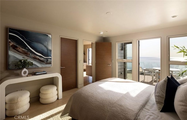 bedroom featuring light hardwood / wood-style floors