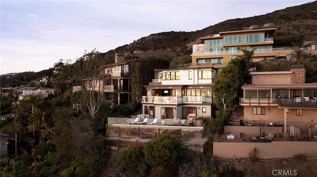 view of building exterior featuring a mountain view