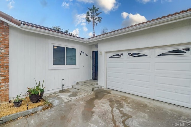 property entrance featuring a garage