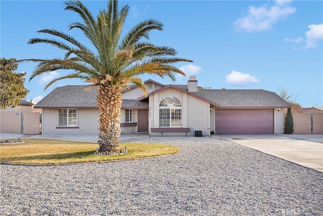 single story home featuring a garage