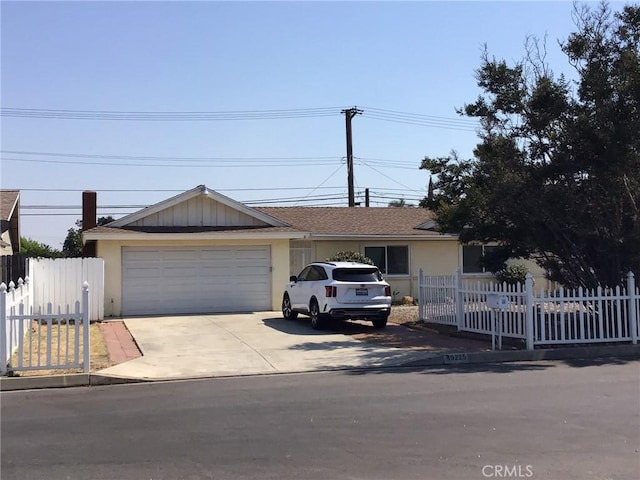 ranch-style home with a garage