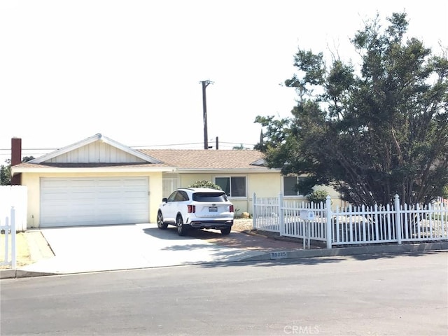 ranch-style home with a garage