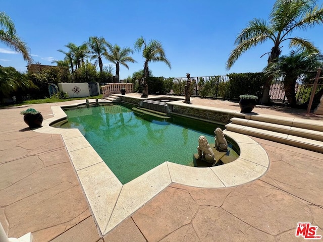 view of pool with a patio area