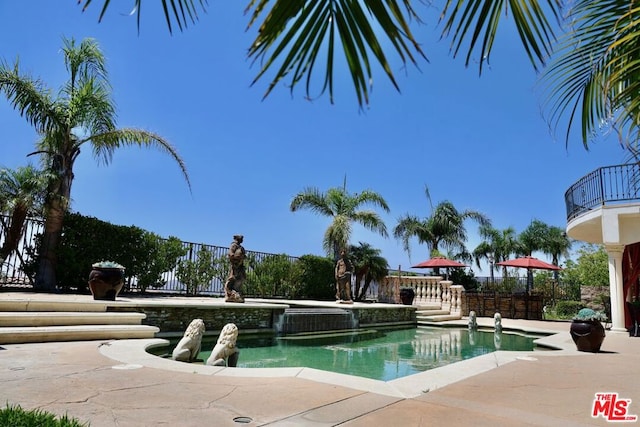 view of pool with a patio area