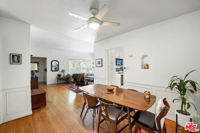 dining room featuring ceiling fan and light hardwood / wood-style flooring