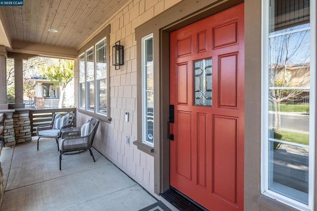 doorway to property with a porch