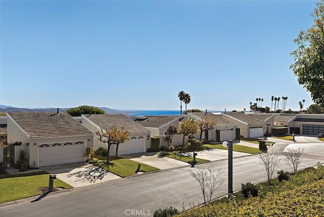 ranch-style house featuring a garage