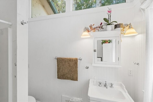 bathroom with sink and toilet