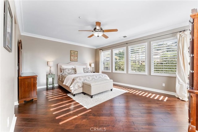 bedroom with multiple windows, ornamental molding, and ceiling fan