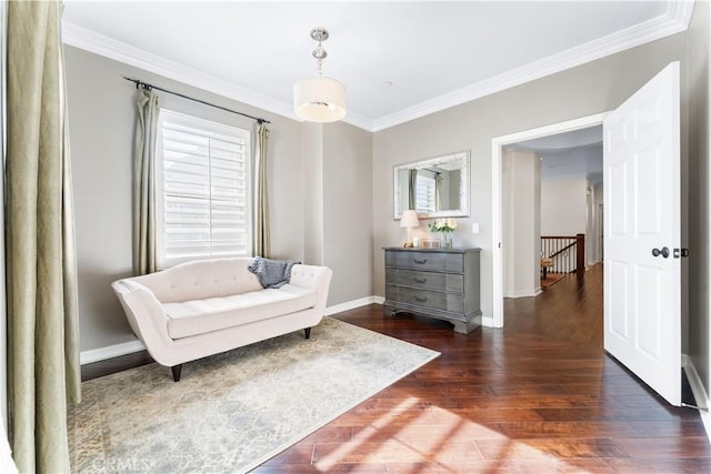 living area with ornamental molding, dark hardwood / wood-style flooring, and a wealth of natural light