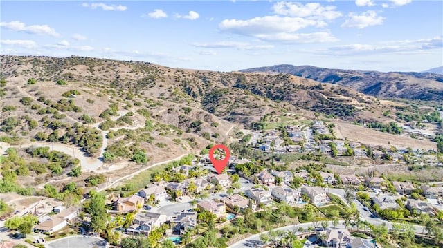 bird's eye view with a mountain view