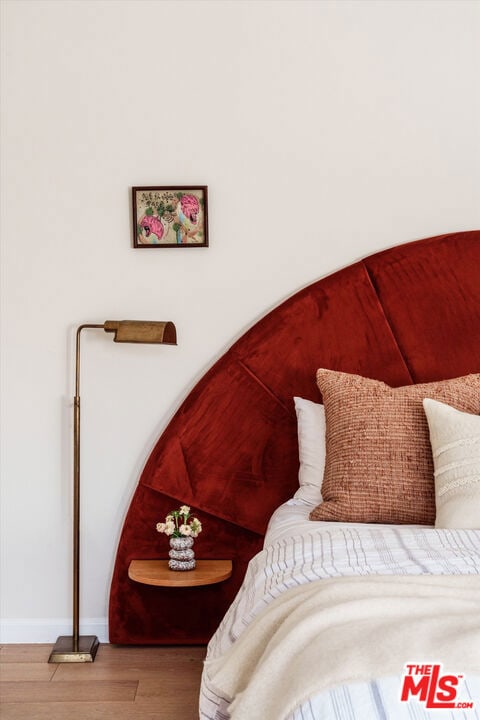 bedroom featuring hardwood / wood-style flooring